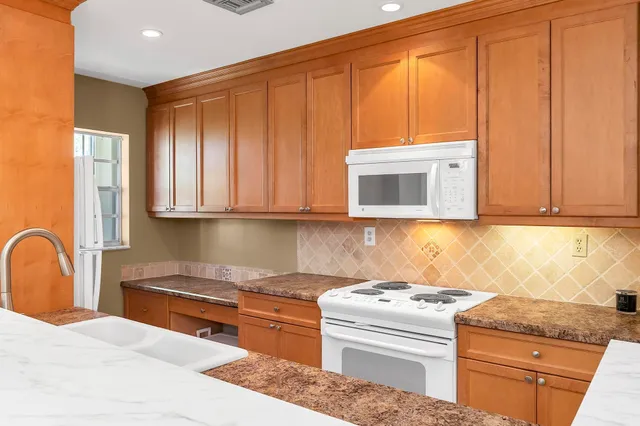 a bed room with a bed and a television