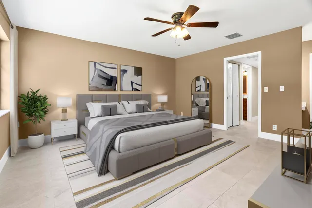 a bathroom with a granite countertop toilet and a shower