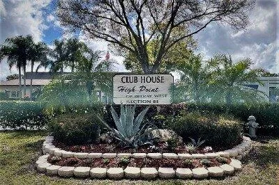 a view of swimming pool with chairs