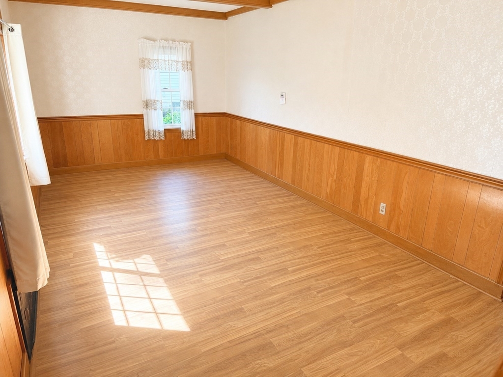 36 Plummer Avenue Lowell, MA 01852 - Photo 10 of 23 a view of empty room with wooden floor