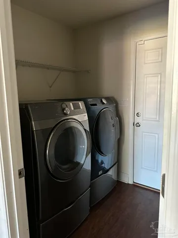 a utility room with dryer and washer