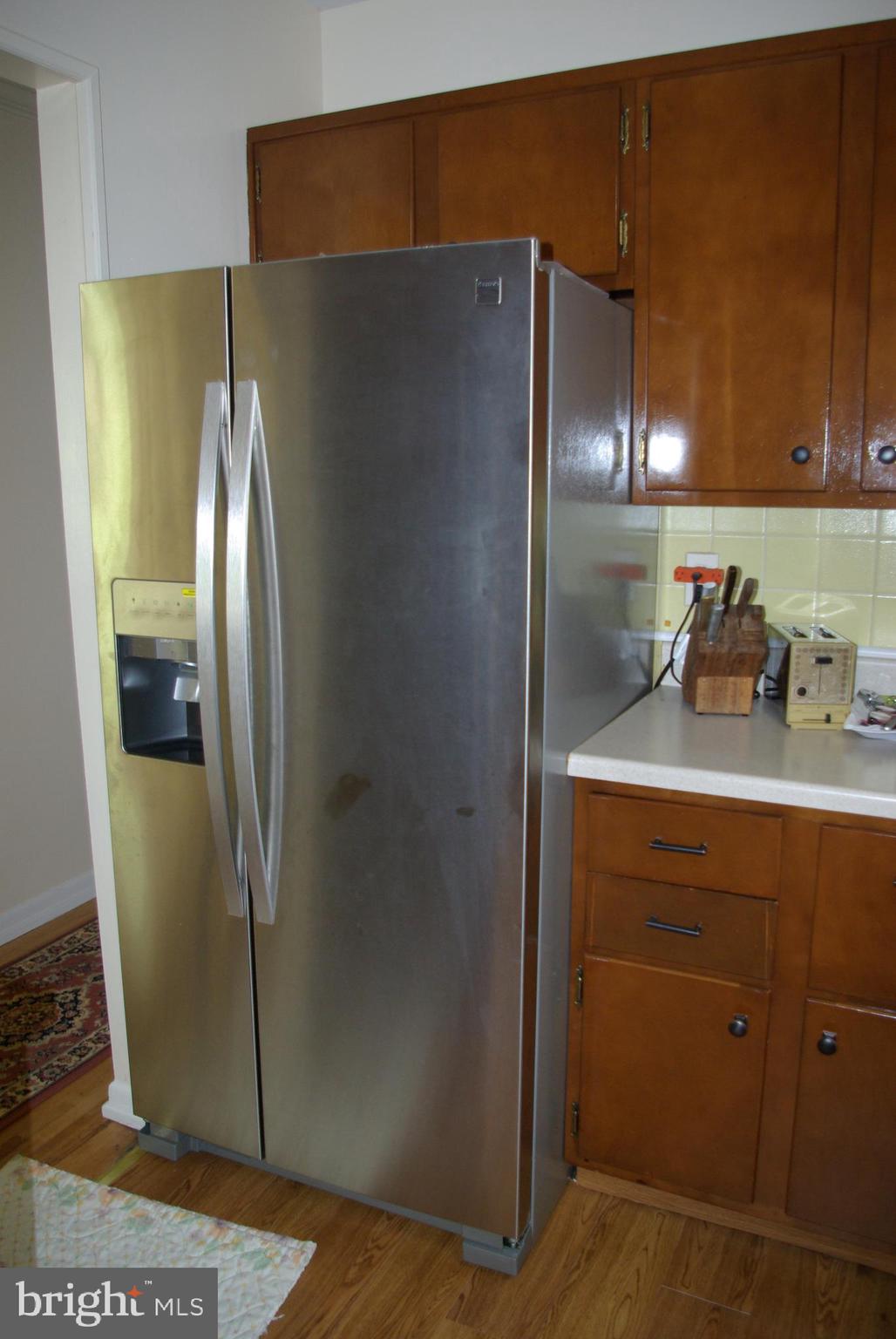 2004 Prichard Road Silver Spring, MD 20902 - Photo 7 of 21 Kitchen refrigerator next to sink area