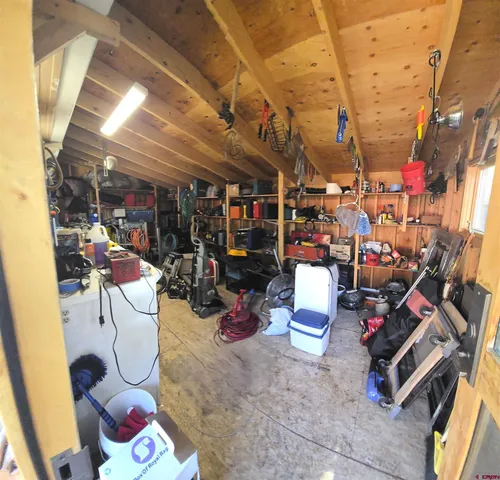 a view of a storage room with racks