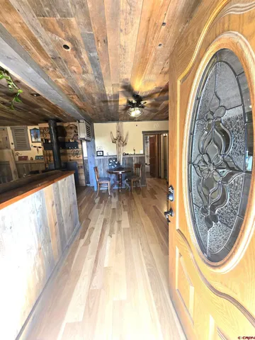 a view of a living room and bathroom