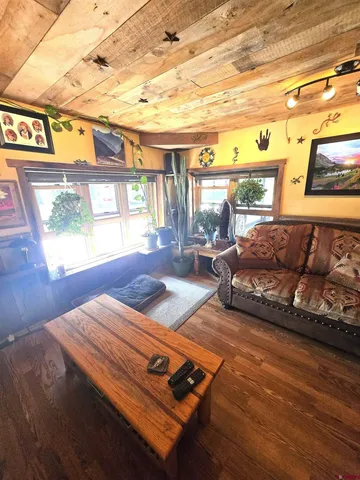 a view of a living room with furniture