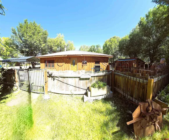 a view of a swimming pool with a patio