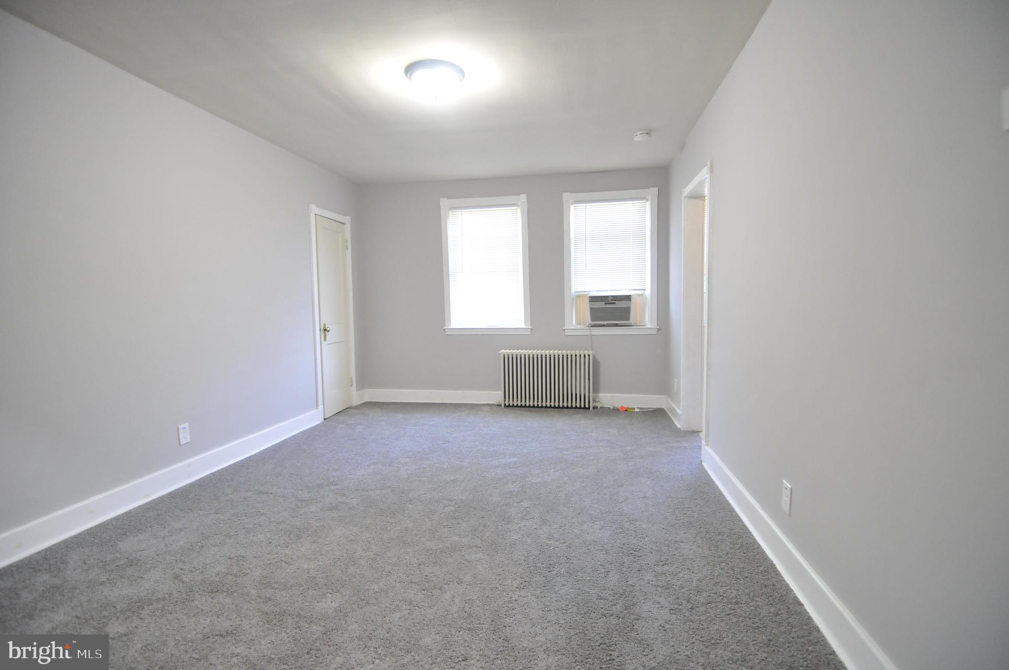 913 St Dunstans Road Baltimore, MD 21212 - Photo 16 of 28 an empty room with windows