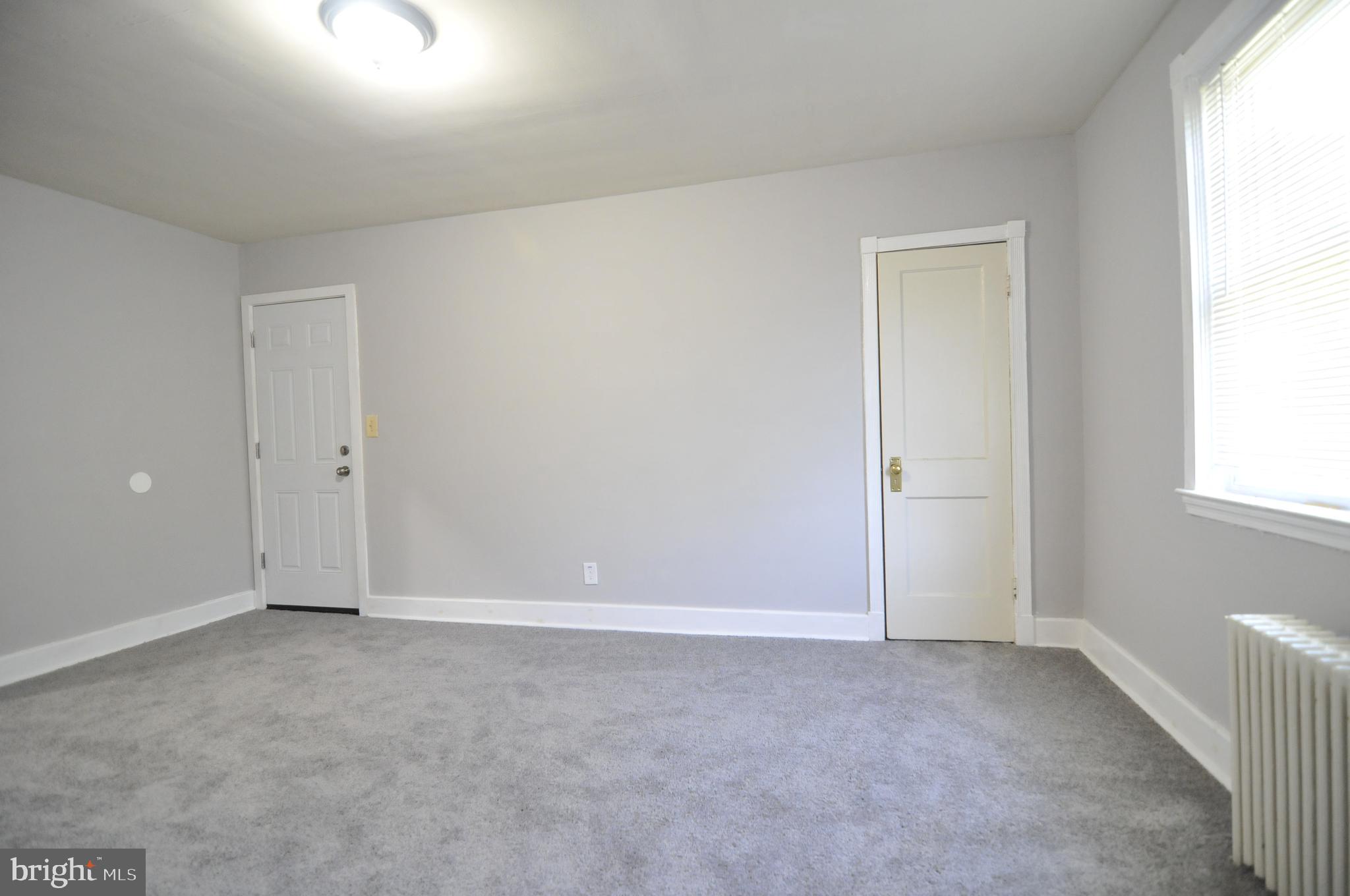913 St Dunstans Road Baltimore, MD 21212 - Photo 17 of 28 an empty room with an entryway
