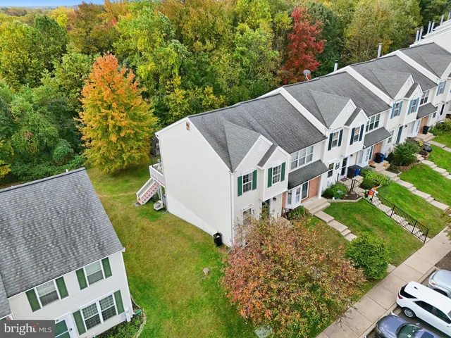an aerial view of residential house with outdoor space