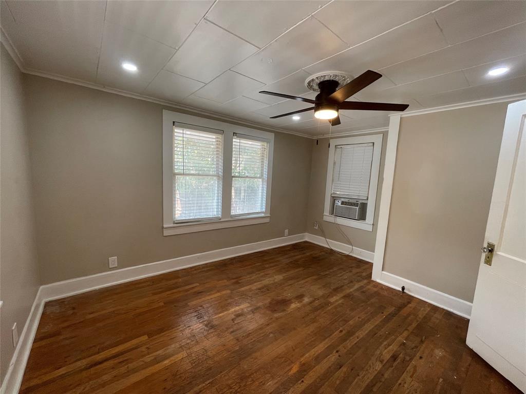 2012 Sanguinet Street Fort Worth, TX 76107 - Photo 5 of 11 a view of empty room with wooden floor and fan