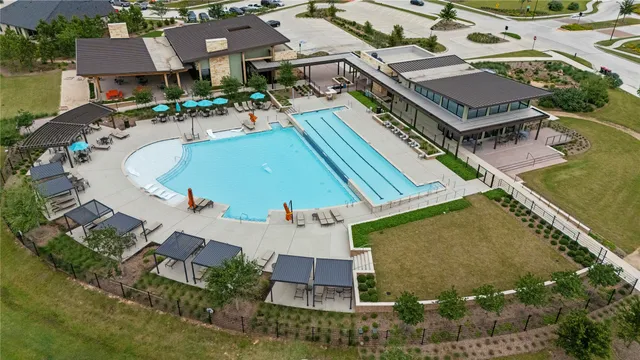 an aerial view of a city with a lake view