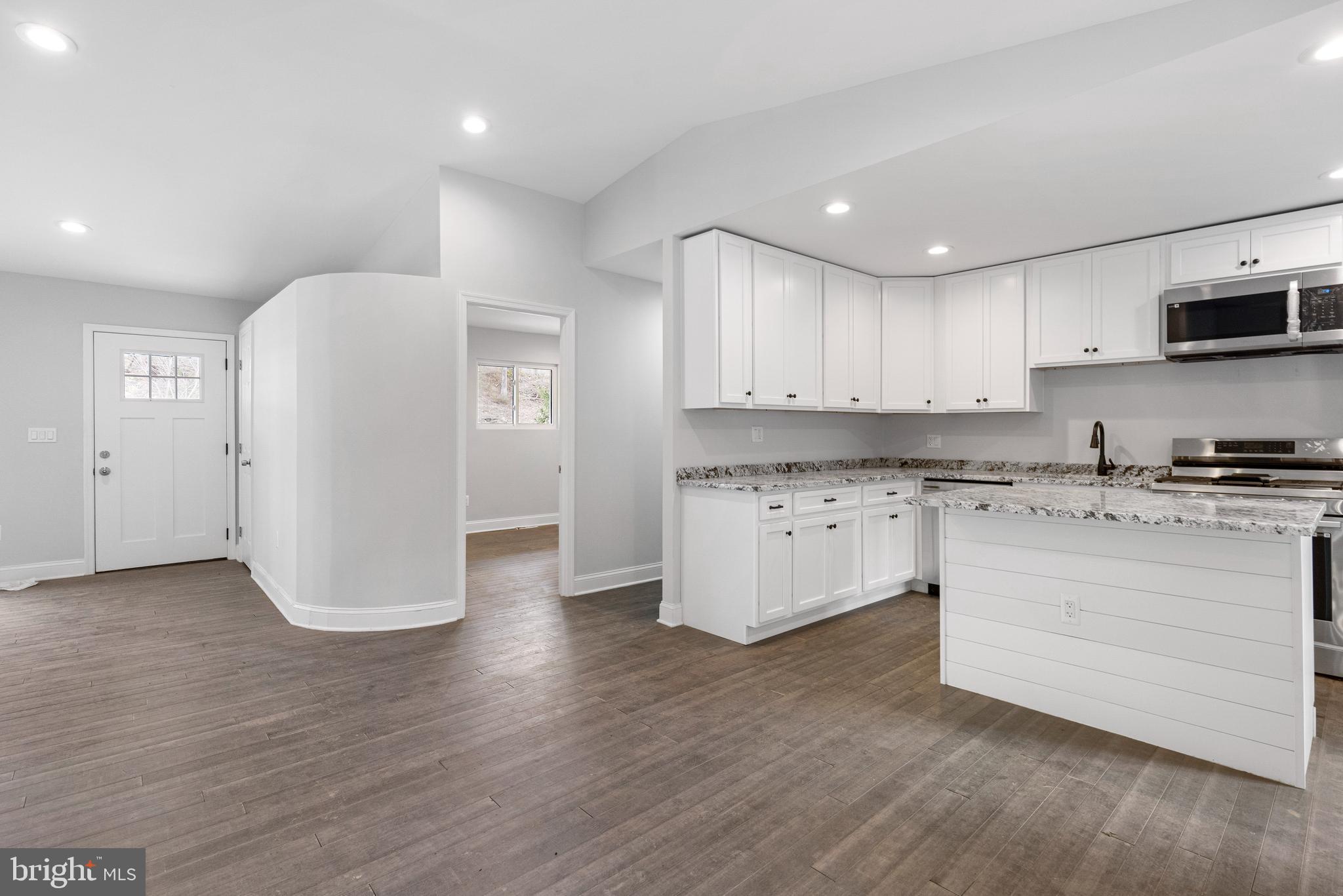 9725 Plowline Road Randallstown, MD 21133 - Photo 3 of 30 Spacious Kitchen with Plenty of Cabinets and Prep