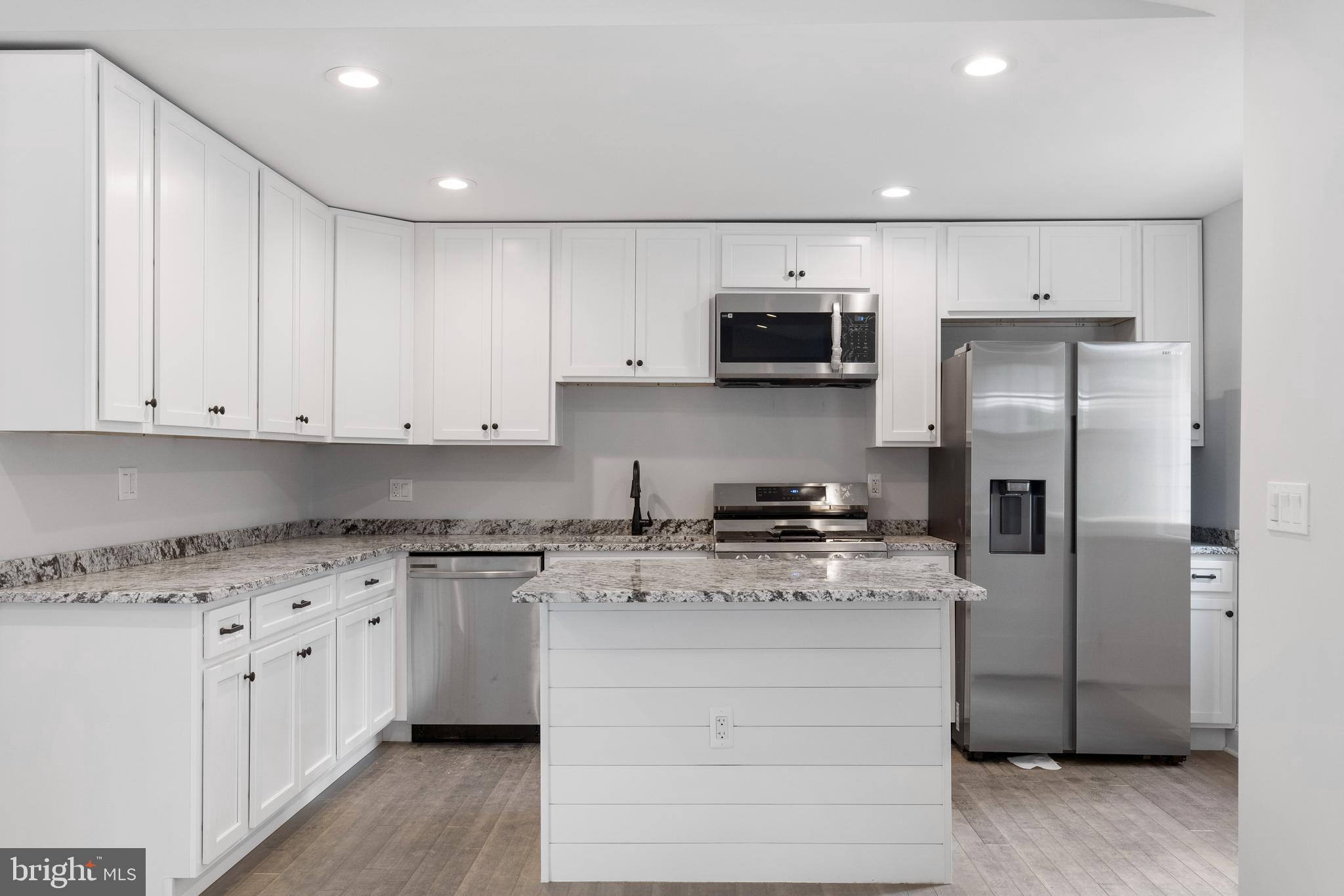 9725 Plowline Road Randallstown, MD 21133 - Photo 5 of 30 Island with Granite Countertops