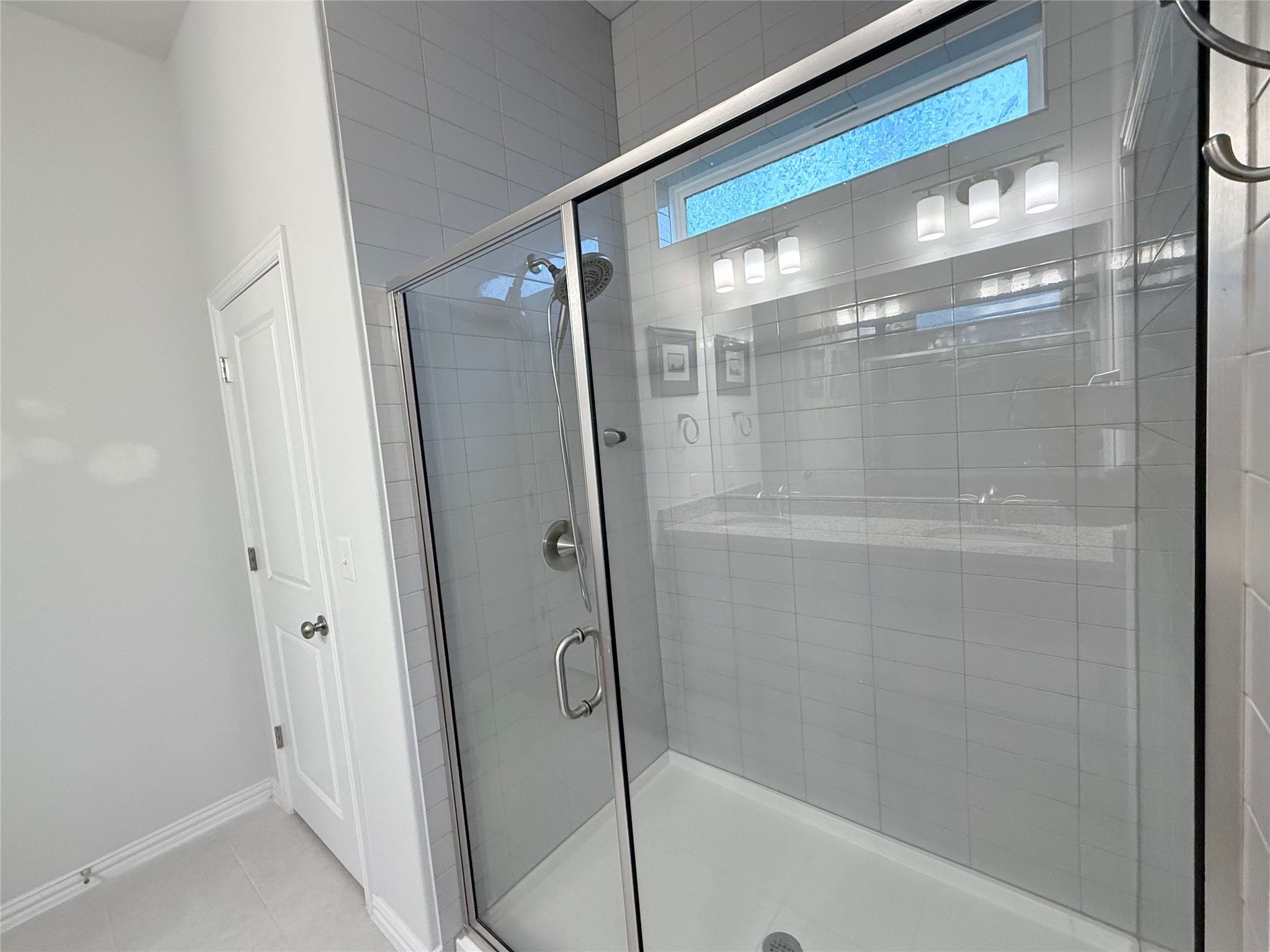 4516 Sea Salt Drive Austin, TX 78747 - Photo 7 of 14 Large walk in shower in the main bathroom