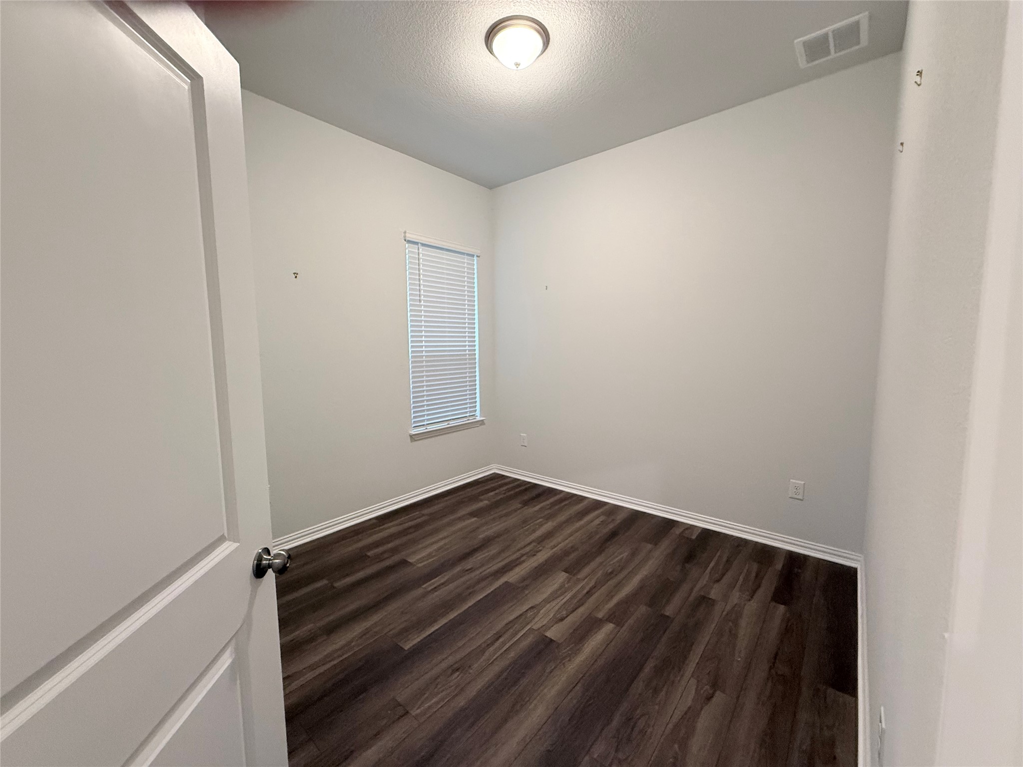 4516 Sea Salt Drive Austin, TX 78747 - Photo 9 of 14 Second bedroom with closet