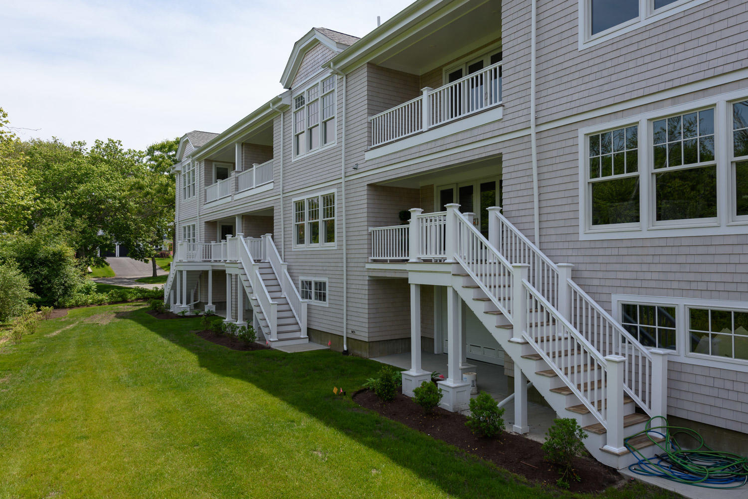 780 Craigville Beach Road, Unit F2 Centerville, MA 02632 - Photo 11 of 13 a front view of house with yard and green space