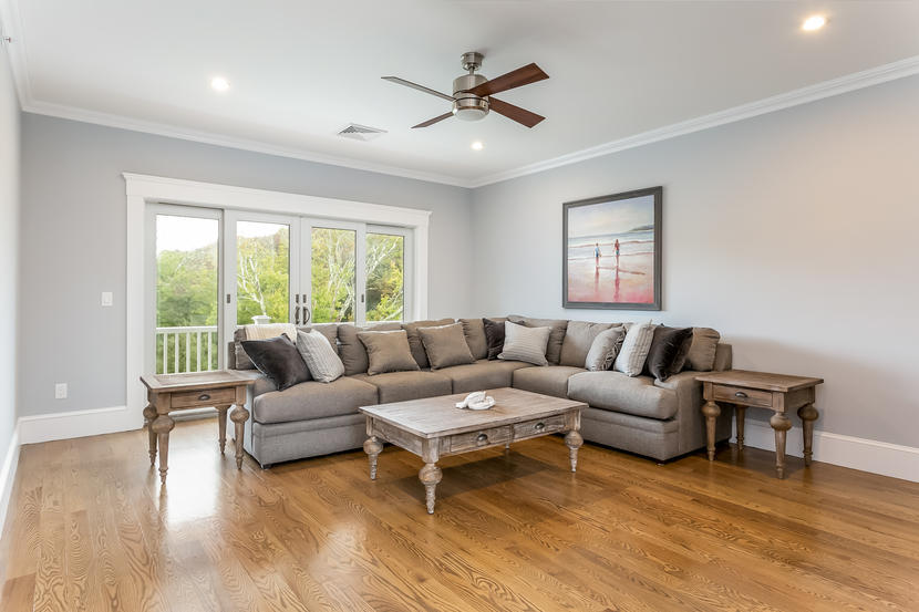 780 Craigville Beach Road, Unit F2 Centerville, MA 02632 - Photo 5 of 13 a living room with furniture and a large window