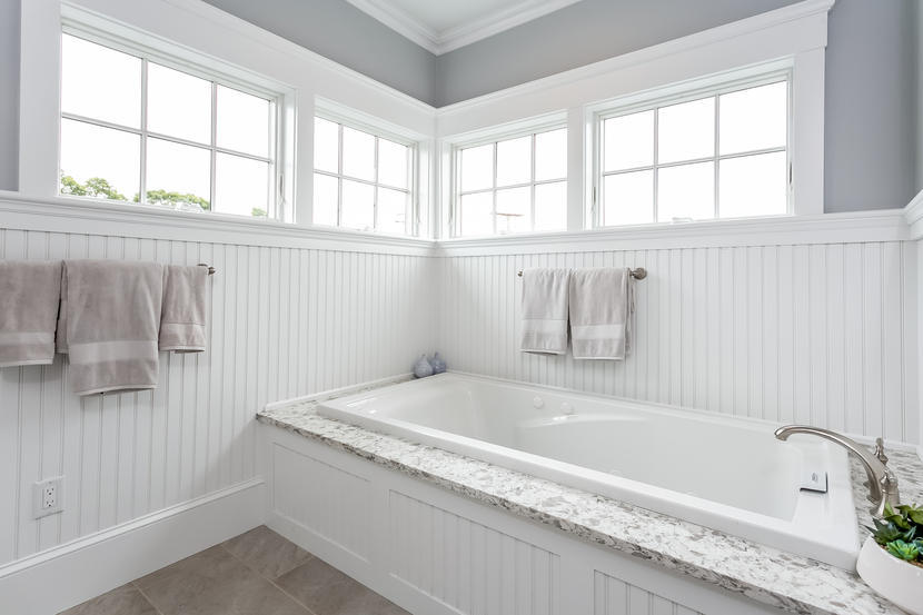 780 Craigville Beach Road, Unit F2 Centerville, MA 02632 - Photo 6 of 13 a bathroom with a bathtub and next to a window