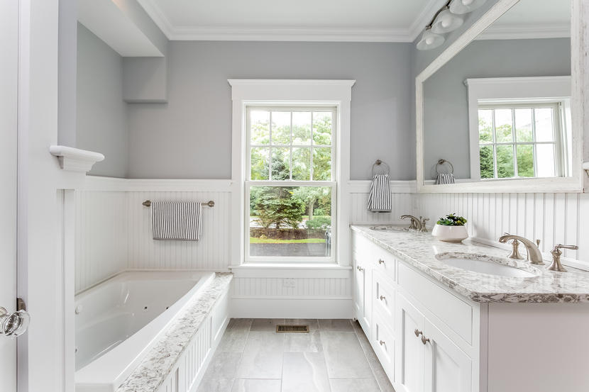 780 Craigville Beach Road, Unit F2 Centerville, MA 02632 - Photo 8 of 13 a bathroom with a granite countertop tub a sink a window and a shower