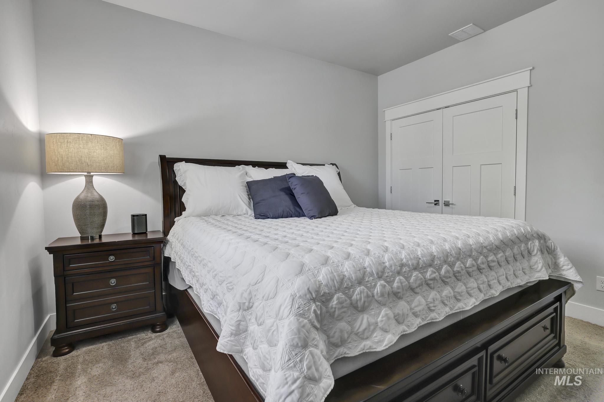 1937 Tamarack Loop Twin Falls, ID 83301 - Photo 28 of 50 Bedroom with neutral carpet flooring and light gray walls