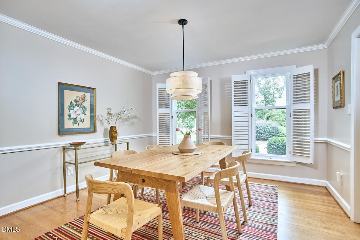 8109 Olde Hill Court Raleigh, NC 27615 - Photo 12 of 65 a dining room with furniture window wooden floor