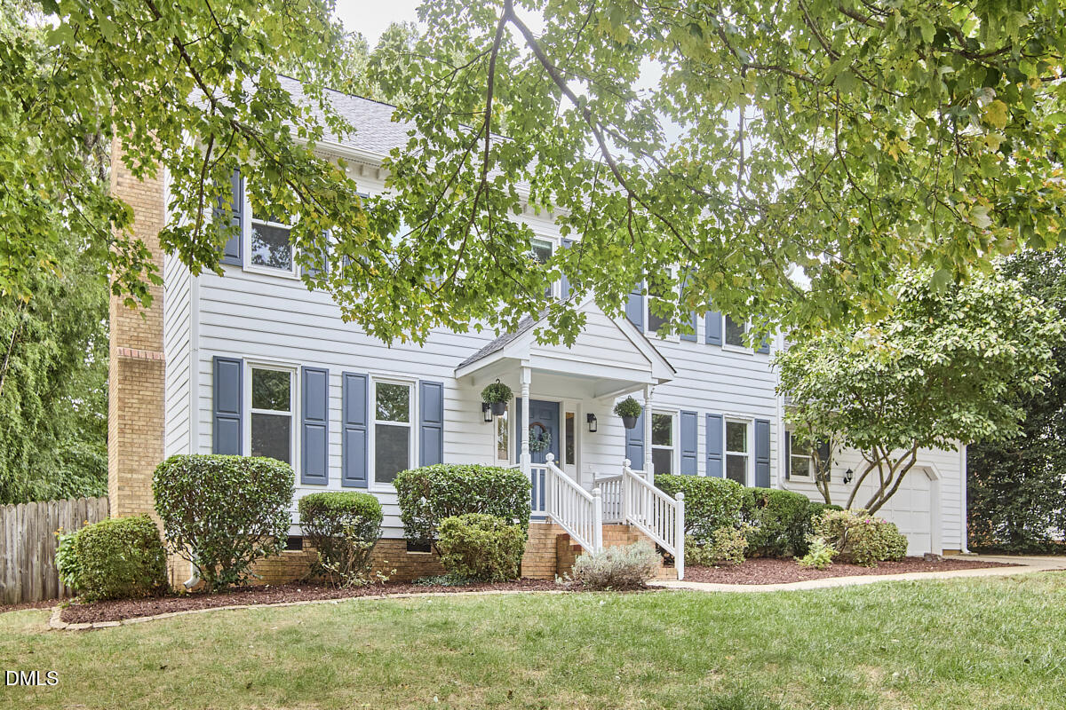 8109 Olde Hill Court Raleigh, NC 27615 - Photo 2 of 65 a front view of a house with a yard
