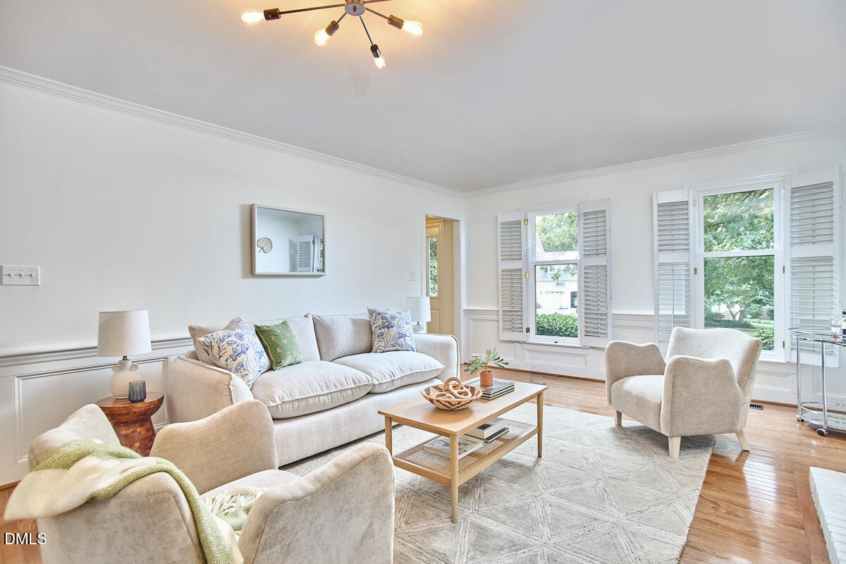 8109 Olde Hill Court Raleigh, NC 27615 - Photo 25 of 65 a living room with furniture and a rug