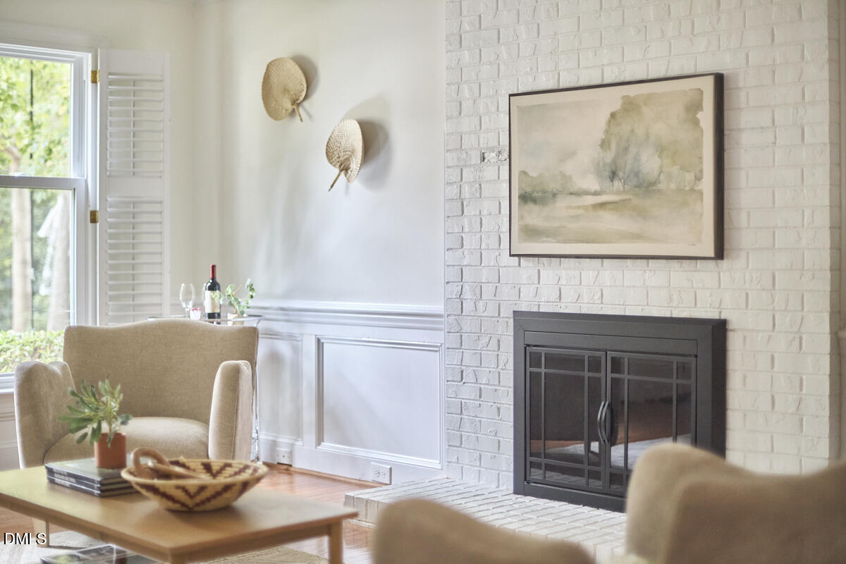 8109 Olde Hill Court Raleigh, NC 27615 - Photo 27 of 65 a living room with furniture and a fireplace