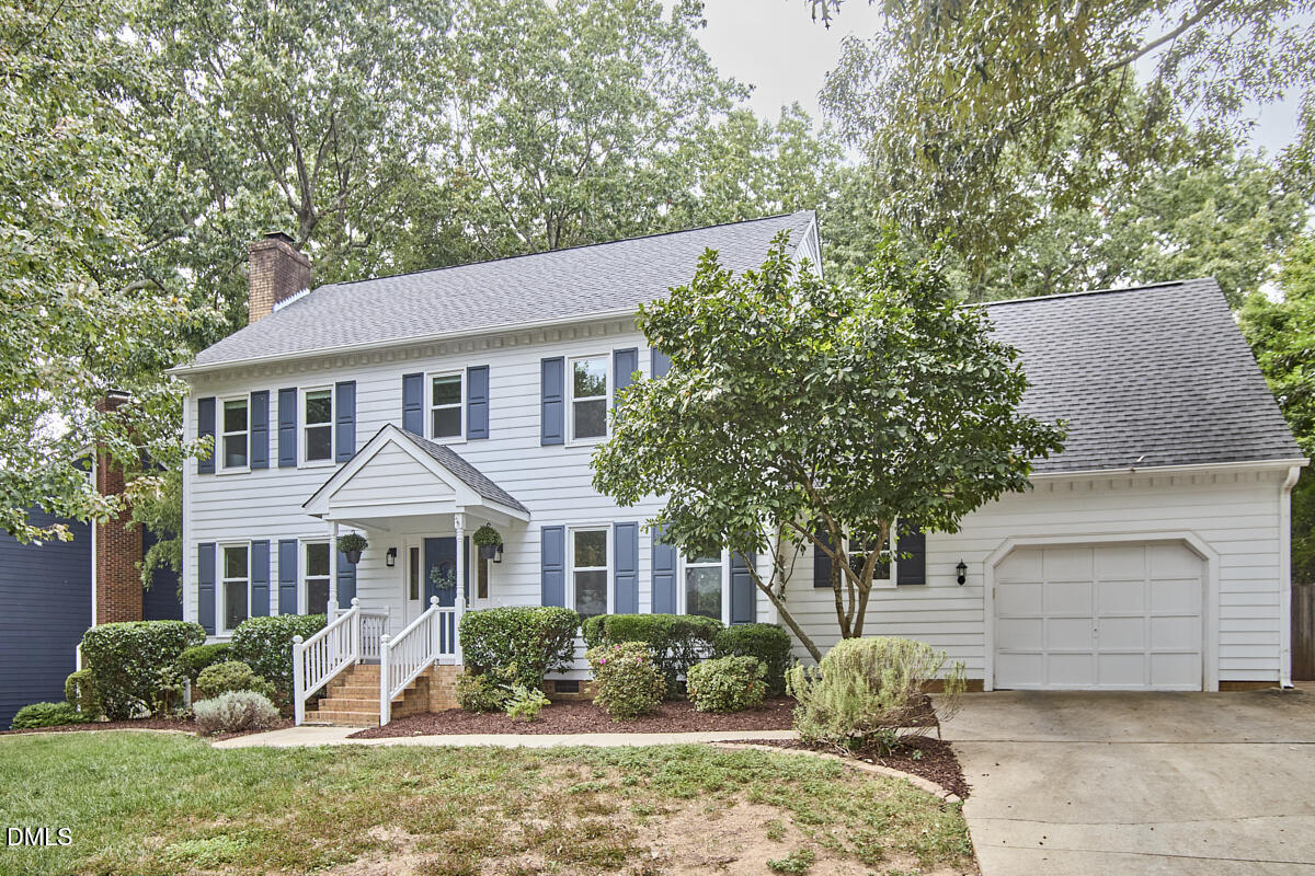 8109 Olde Hill Court Raleigh, NC 27615 - Photo 3 of 65 front view of a house with a yard