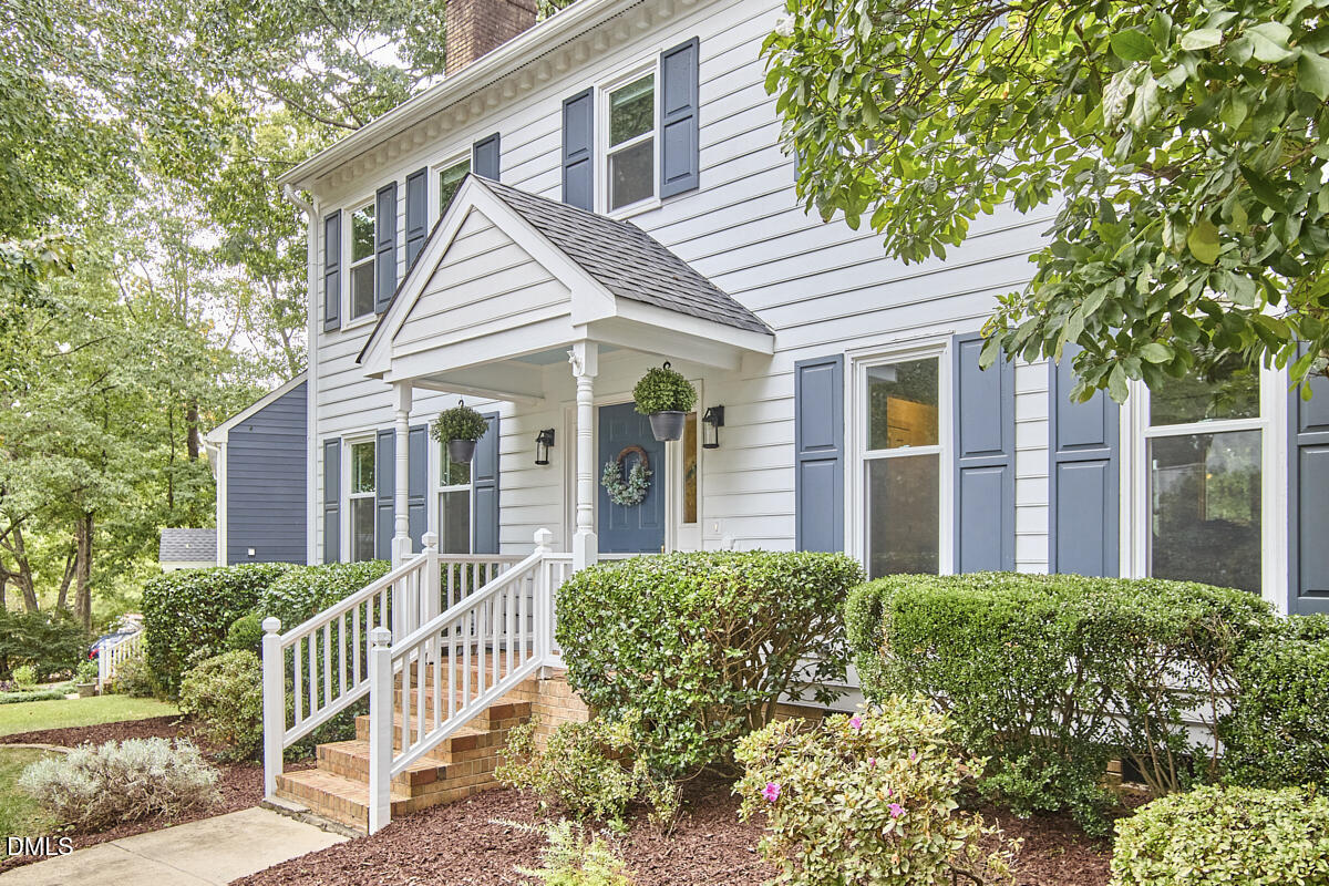 8109 Olde Hill Court Raleigh, NC 27615 - Photo 4 of 65 front view of a house with a yard