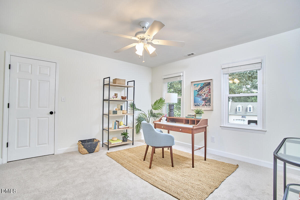 8109 Olde Hill Court Raleigh, NC 27615 - Photo 44 of 65 a workspace with wooden floor and a window