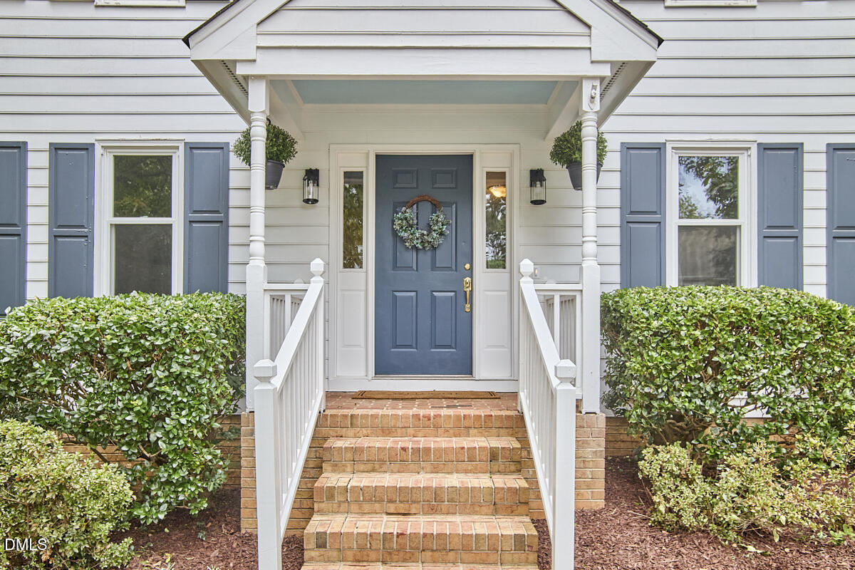 8109 Olde Hill Court Raleigh, NC 27615 - Photo 5 of 65 front view of a house with a porch
