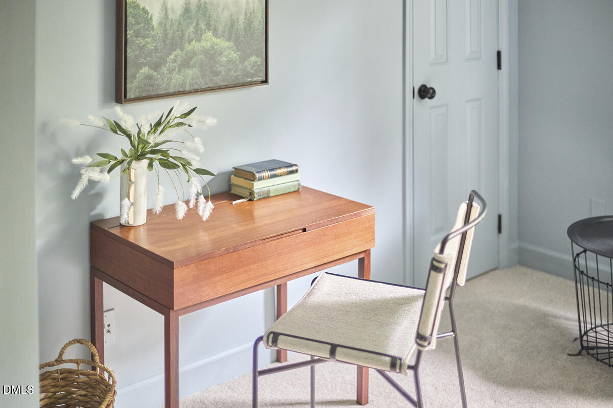 8109 Olde Hill Court Raleigh, NC 27615 - Photo 54 of 65 a view of a dining room with furniture and wooden floor