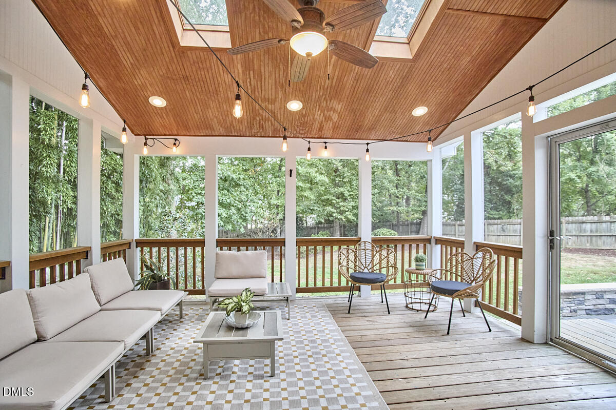 8109 Olde Hill Court Raleigh, NC 27615 - Photo 58 of 65 a living room with furniture and a large window