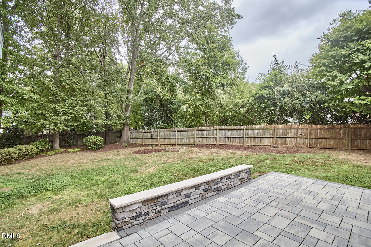 8109 Olde Hill Court Raleigh, NC 27615 - Photo 60 of 65 a view of a backyard with pathway