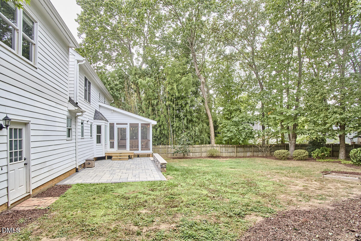 8109 Olde Hill Court Raleigh, NC 27615 - Photo 62 of 65 a front view of a house with a yard