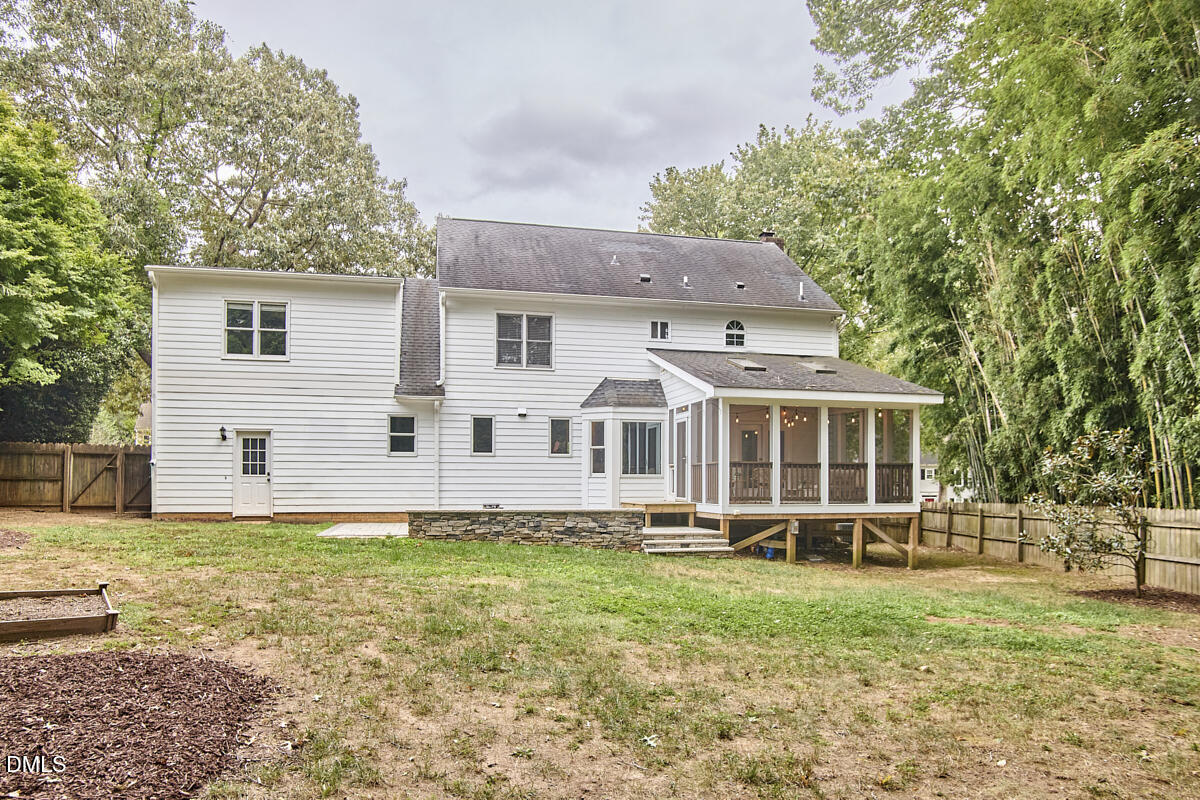 8109 Olde Hill Court Raleigh, NC 27615 - Photo 64 of 65 a front view of a house with a yard