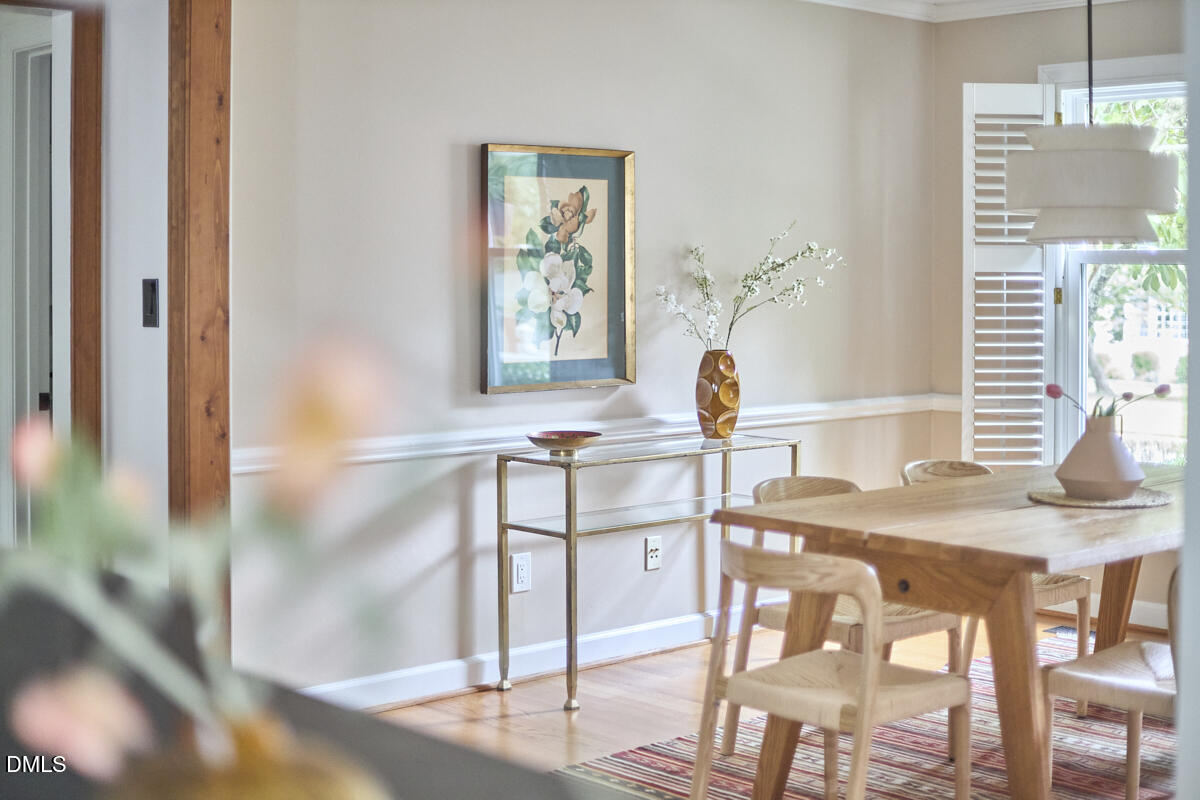 8109 Olde Hill Court Raleigh, NC 27615 - Photo 9 of 65 a dining room with furniture and window
