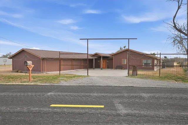 a view of a livingroom with furniture and staircase