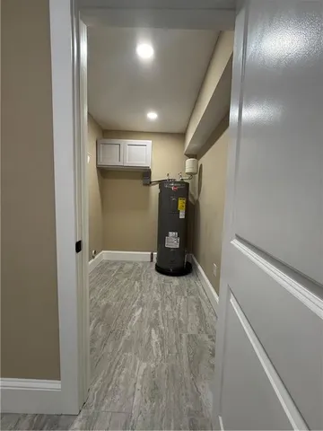 a view of a livingroom with a refrigerator