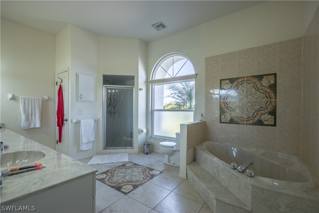 38830 Washington Loop Road Punta Gorda, FL 33982 - Photo 16 of 25 a living room with furniture and a window