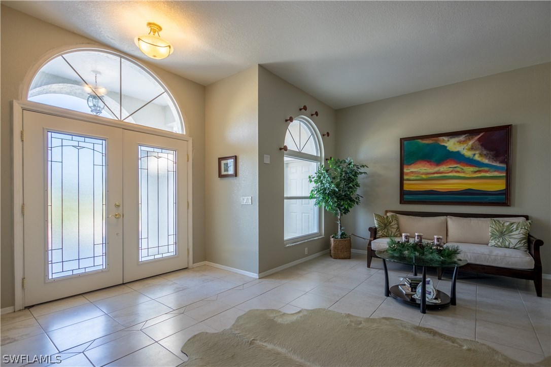 38830 Washington Loop Road Punta Gorda, FL 33982 - Photo 6 of 25 a living room with furniture and a large window