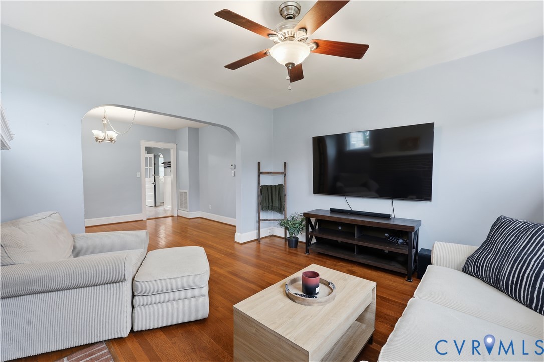 8077 Signal Hill Road Mechanicsville, VA 23111 - Photo 6 of 24 Living area with wood-finish flooring, light blue