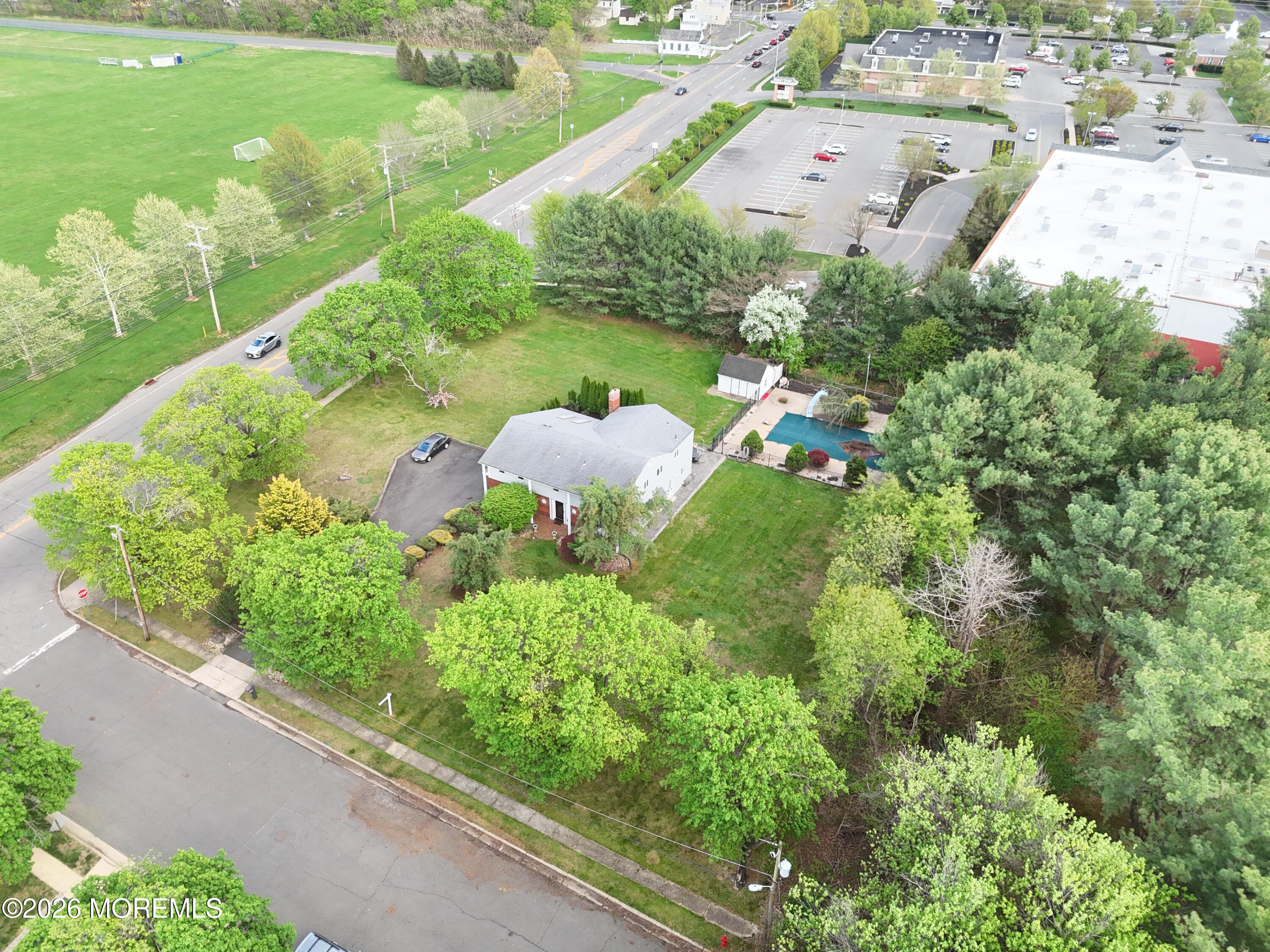 1 Flintlock Road Freehold, NJ 07728 - Photo 3 of 40 Right Side High View with Pool