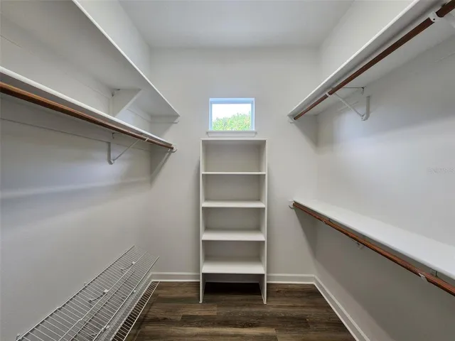 a view of an empty walk in closet