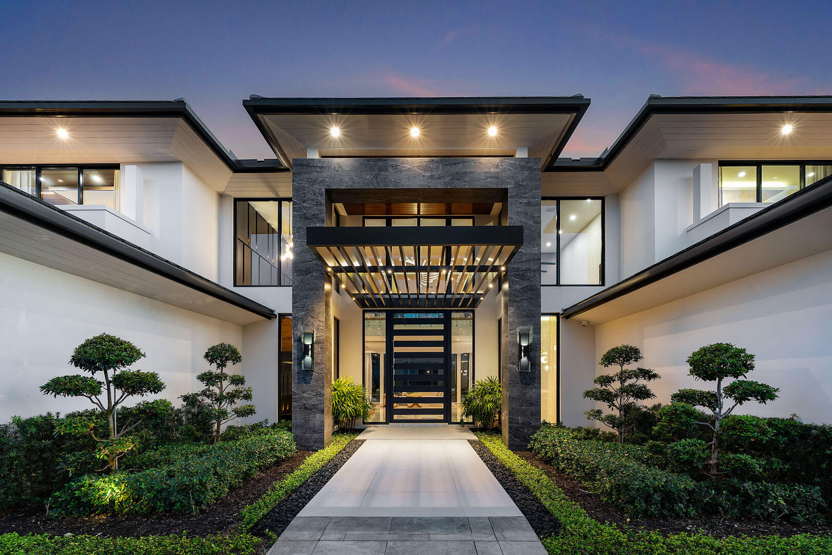 212 Alexander Palm Road Boca Raton, FL 33432 - Photo 5 of 75 212_Alexander_Palm_Road_Dusk_04