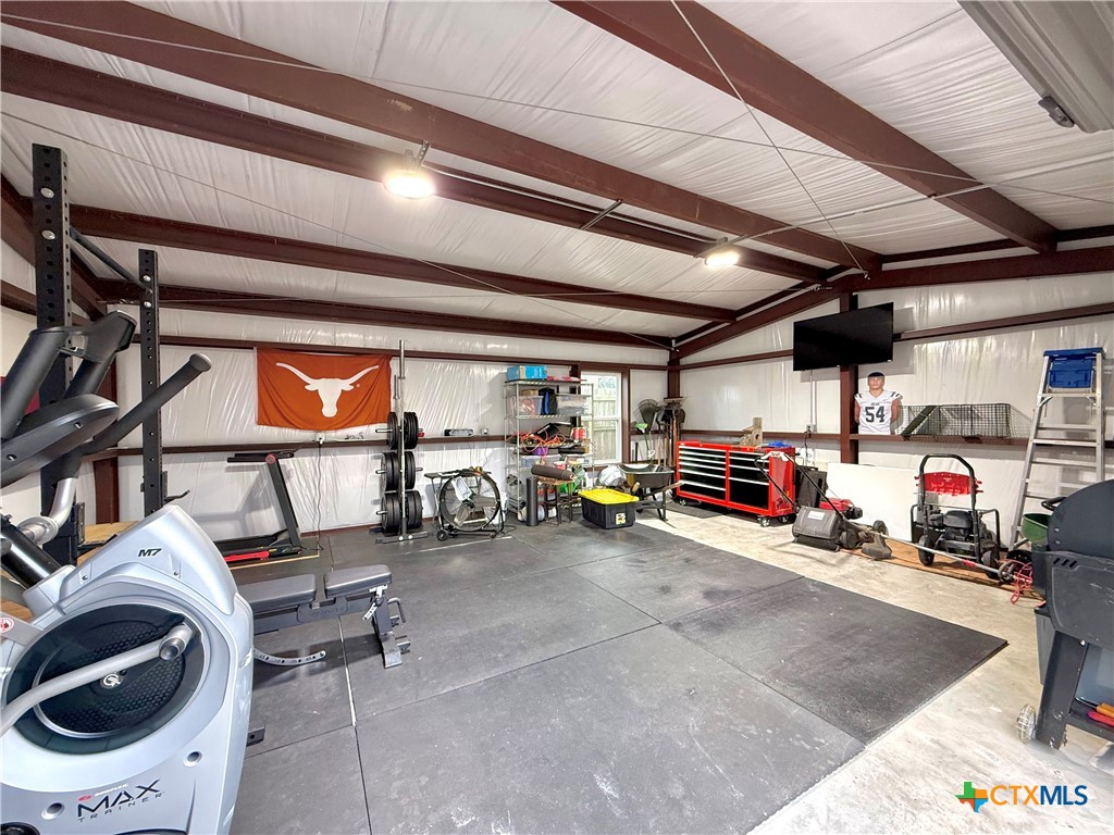 213 Sparrow Lane Victoria, TX 77905 - Photo 40 of 44 a view of a garage with parked cars