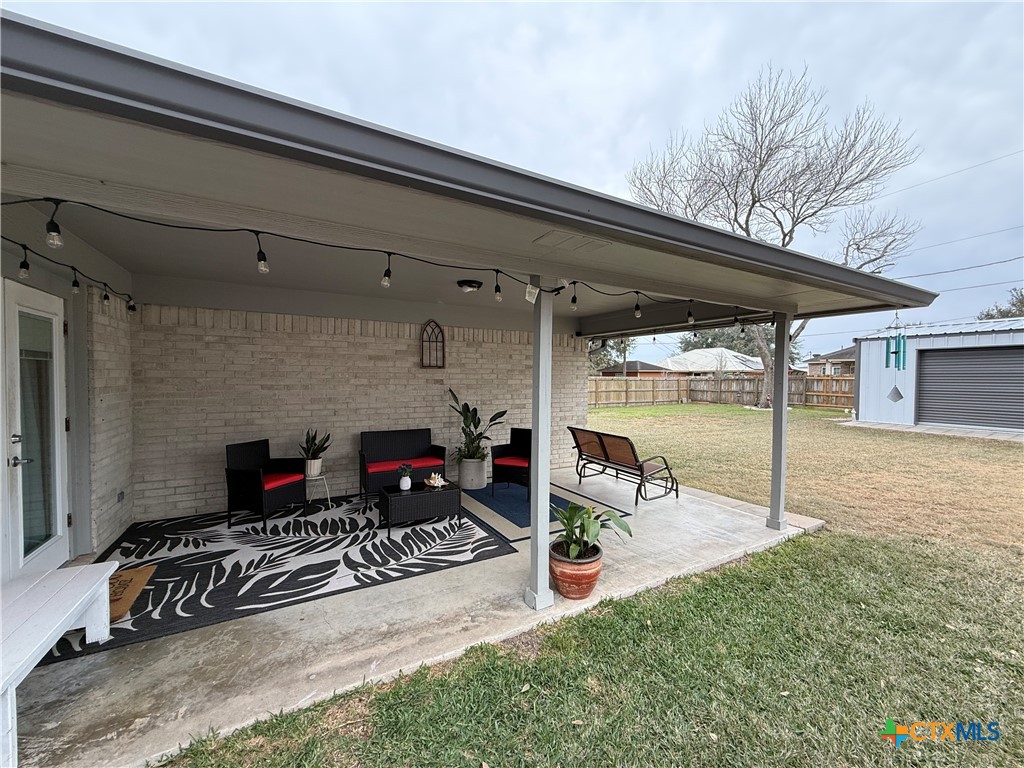 213 Sparrow Lane Victoria, TX 77905 - Photo 41 of 44 a backyard of a house with seating space