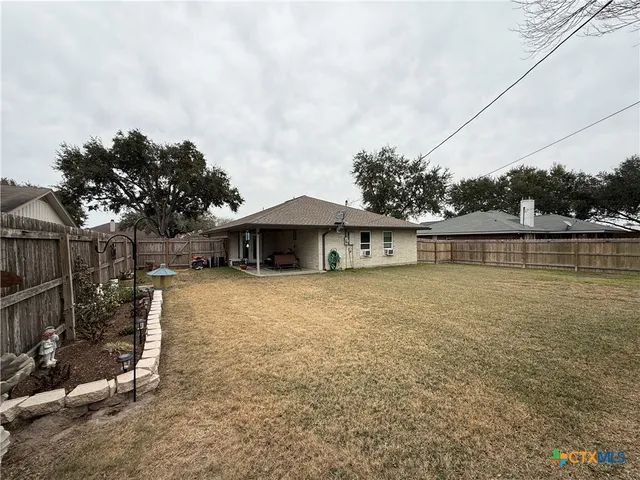 a view of yard with tree s