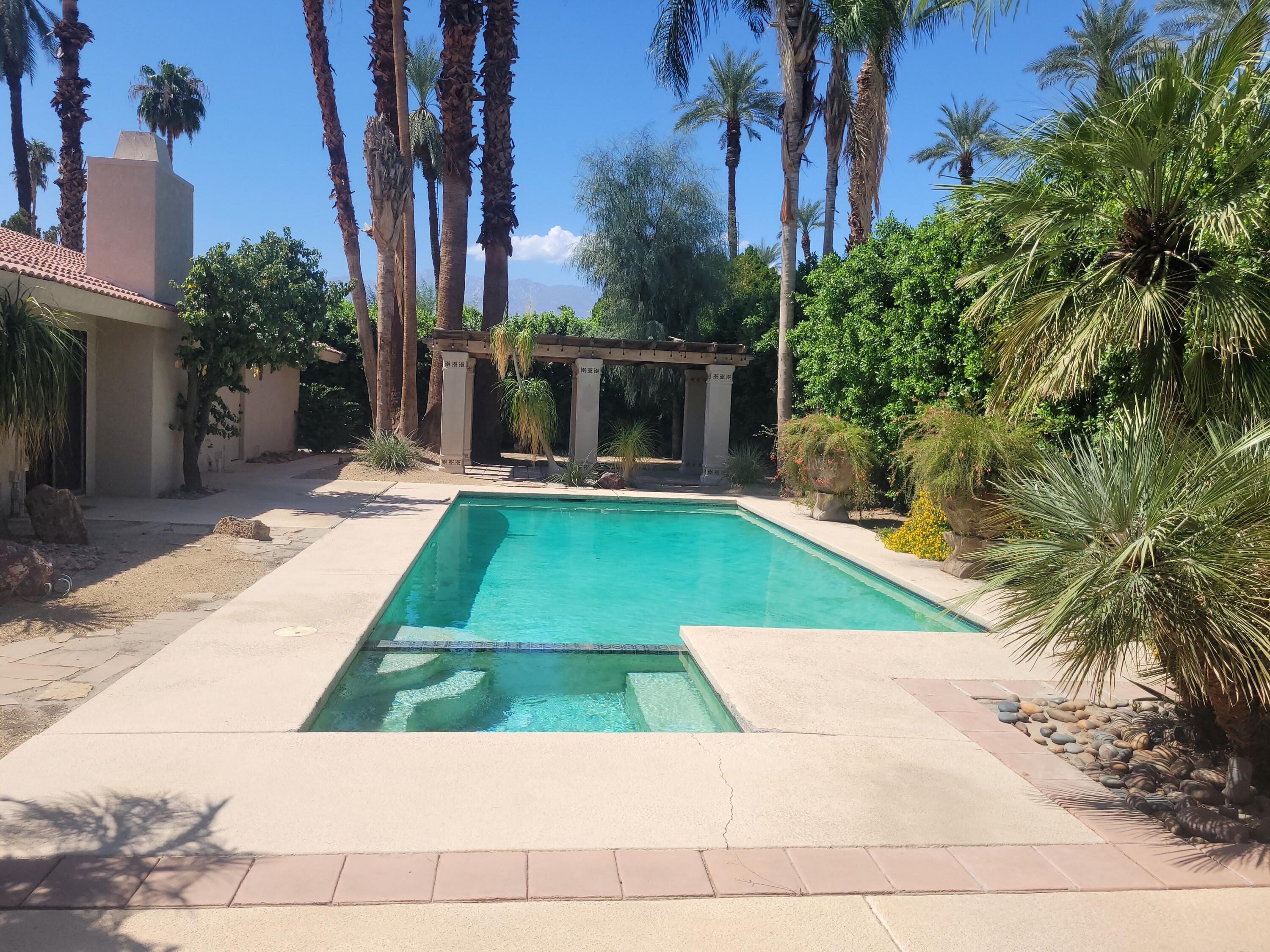 70380 Chappel Road Rancho Mirage, CA 92270 - Photo 1 of 30 a view of backyard with plants and outdoor seating